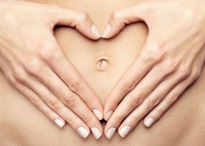 Почему болит пупок при беременности