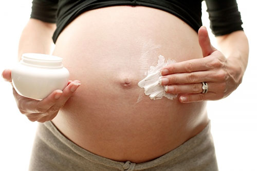 мазать кремом живот